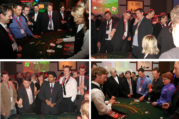 Place your bets! Delegates compete for a USB piano keyboard, a remote-controlled helicopter and an iPod Shuffle.